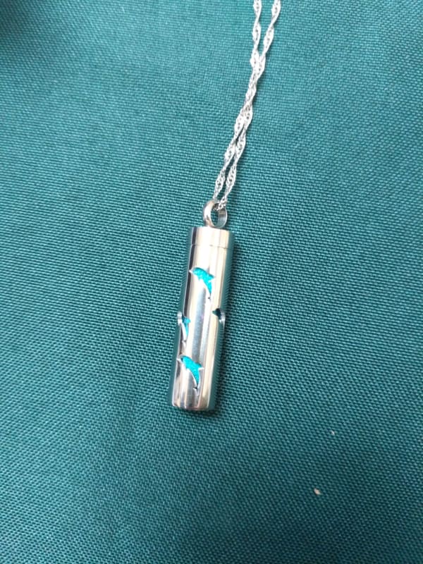 Dolphin cylinder necklace
